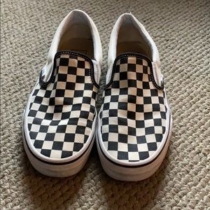 Fairly new black and white checker vans